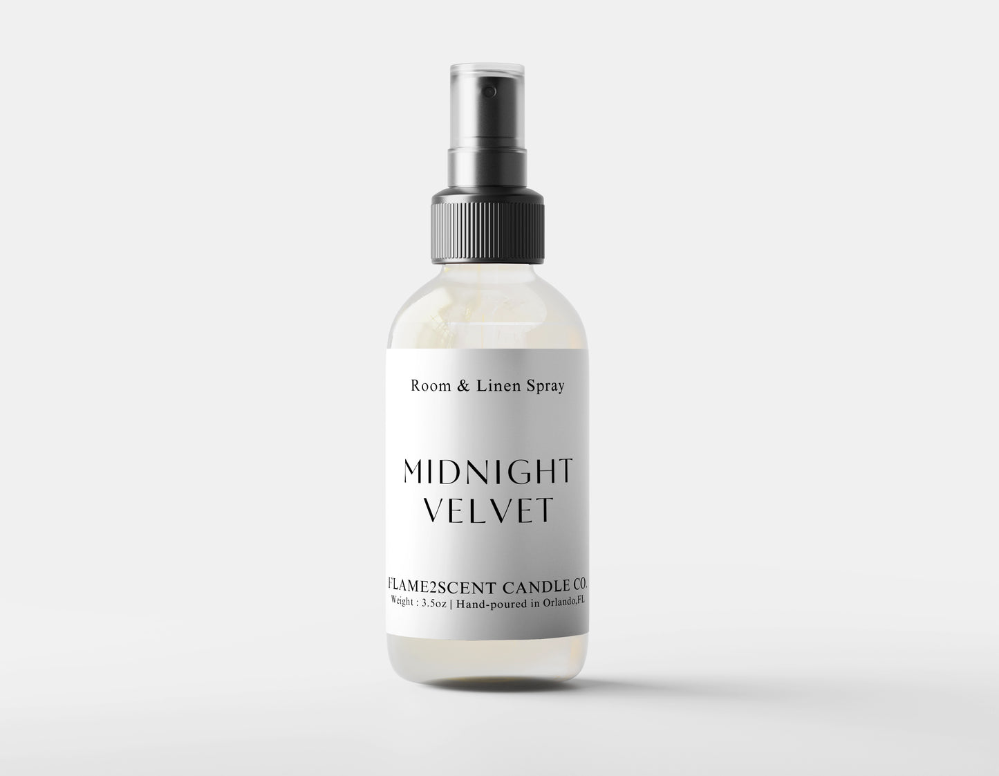 Midnight Velvet Room & Linen Spray in clear bottle with sleek black text label