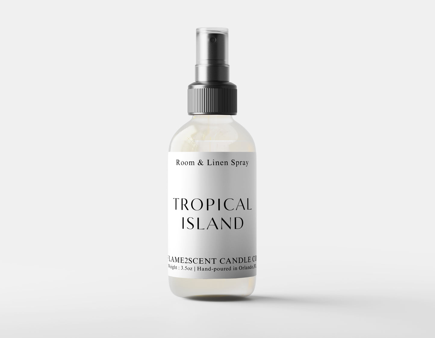 Tropical Island Room Spray bottle with tropical fruit blend label and exotic scent