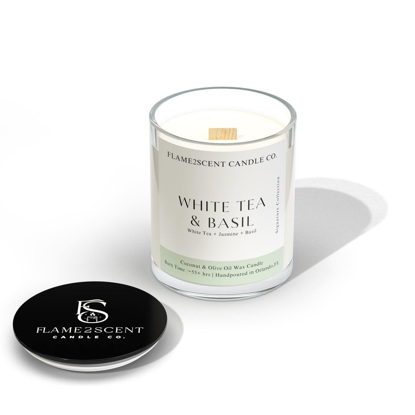 White Tea & Basil candle by Flame2scent Candle Co. with wood wick and soft green label