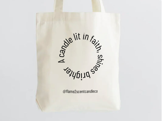 A candle lit in faith shines brighter- Tote Bag