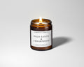 palo santo and cedarwood scented woodwick candle in amber glass jar with black lid