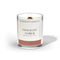 twilight amber candle made with dark amber and ginger lily with palo santo in clear glass jar with woodwick