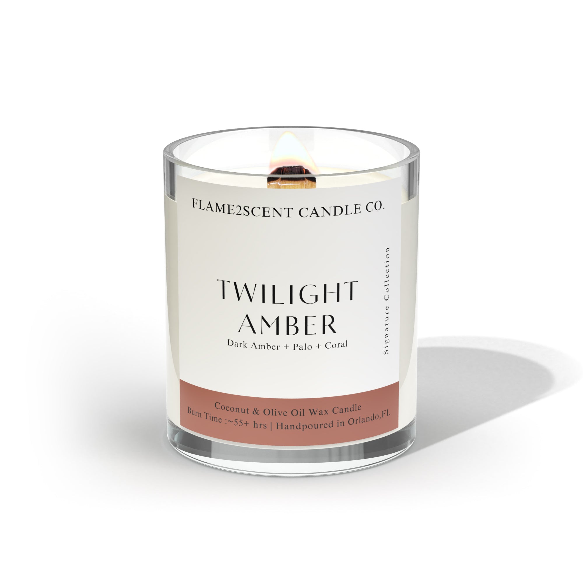 twilight amber candle made with dark amber and ginger lily with palo santo in clear glass jar with woodwick
