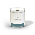 clean burning fig tree and sandalwood scented coconut apricot wood wick candle in clear glass jar with black lid