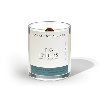 Fig Embers candle in teal label, lit wood wick and earthy blend of fig and sage