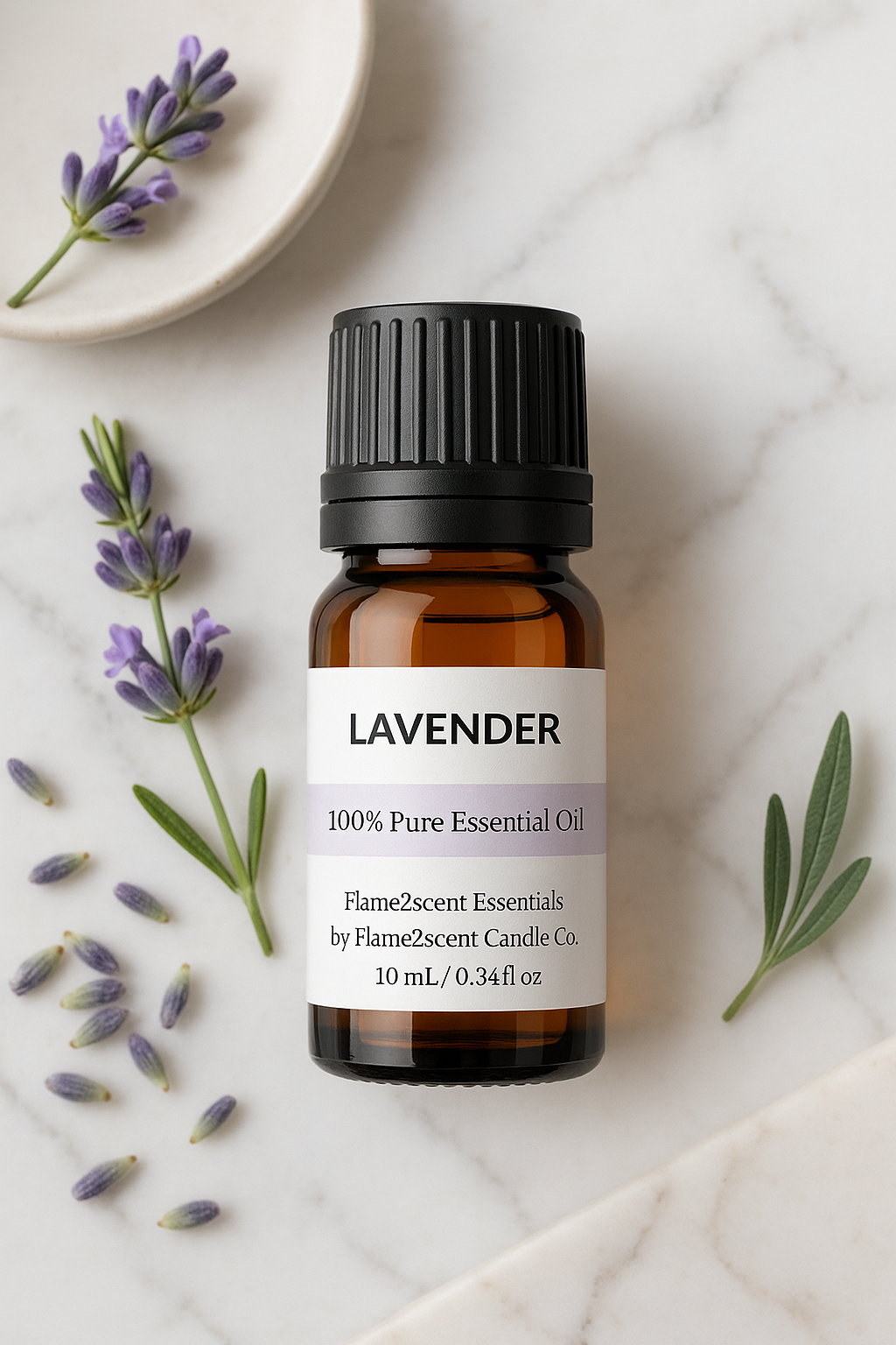 Lavender essential oil bottle with lavender flowers on a marble surface